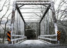 a covered bridge in winter 