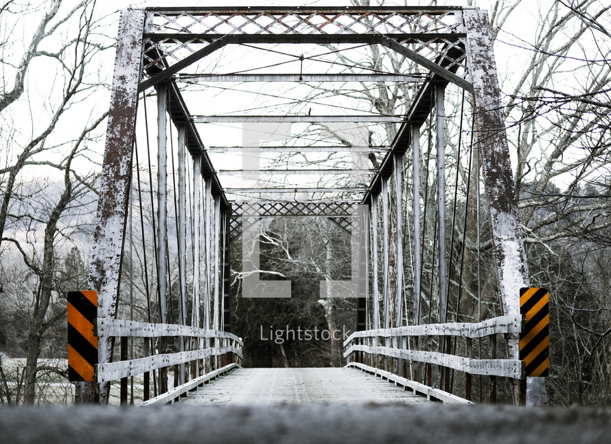 a covered bridge in winter 