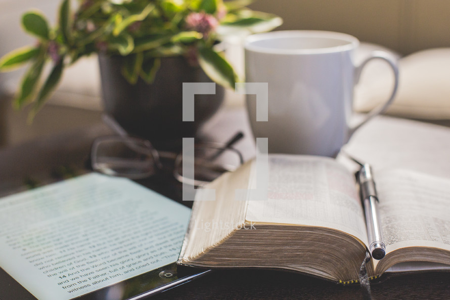 Coffee cup, iPad, Bible, reading glasses 