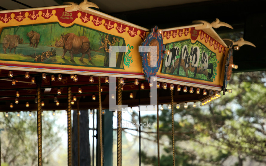 Detailed decorations and painting on an old carrousel.