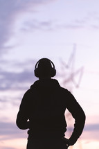 silhouette of a man with headphone 