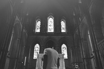 man approaching an altar 