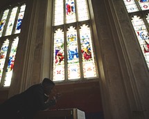 man seeking forgiveness in a church 