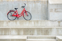parked red bicycle 