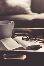 Tea, Bible, and reading glasses on a tray
