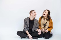 man and woman laughing 