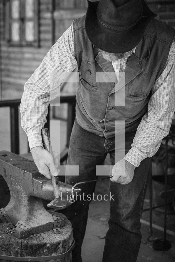 ironsmith shaping metal 