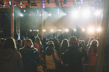 crowds of people in coats at a concert 