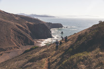walking on a nature trail on cliffs near a sea shore 