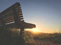 park bench at sunset 