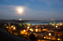 bokeh lights from a distant city below 