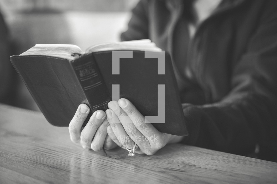 A woman reading a Bible