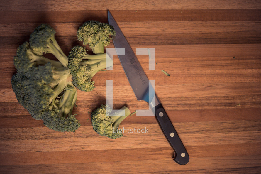 Cutting broccoli.