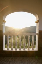 sunburst over a balcony 