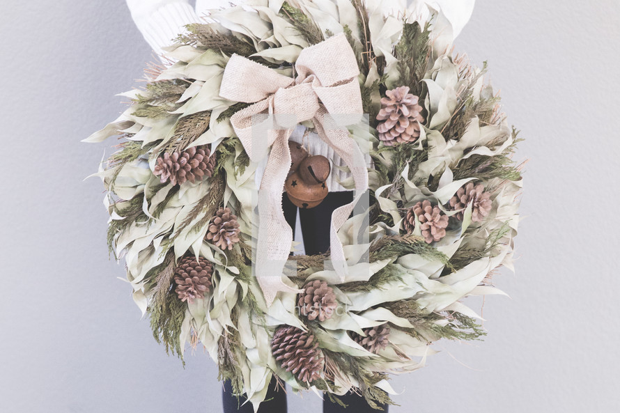 pine cone and dried leaves wreath 