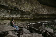 couple sitting in a cave 