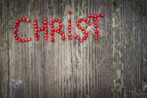 word Christ in red berries 