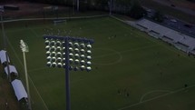 aerial view over soccer practice in a stadium 