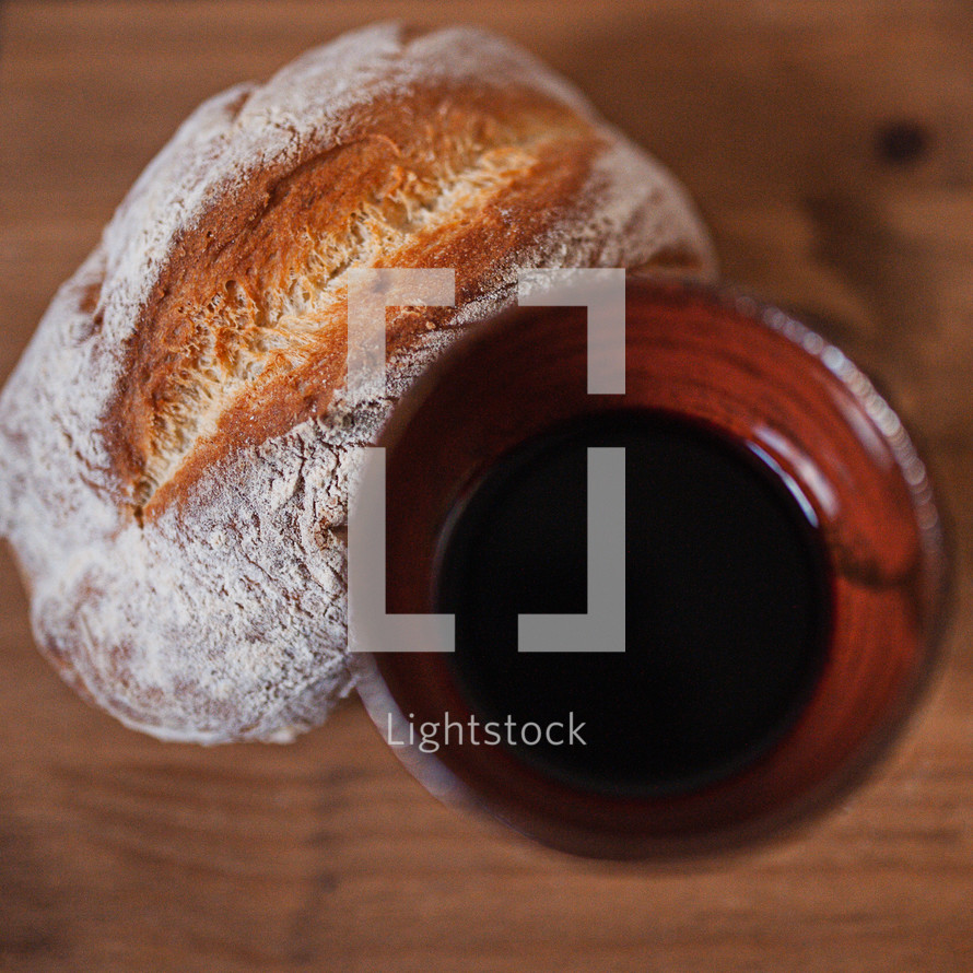 communion wine chalice and loaf of bread 