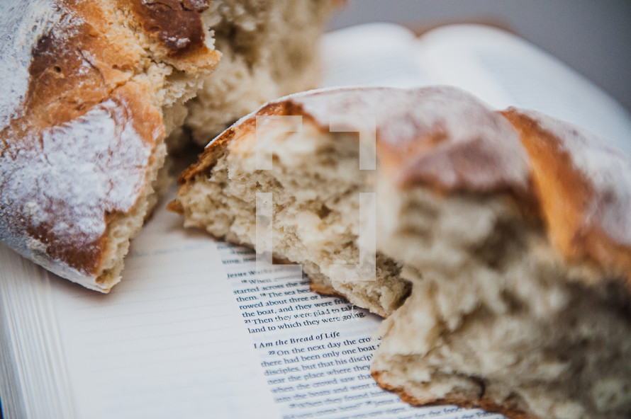 communion bread on the pages of a Bible - I am the bread of Life 