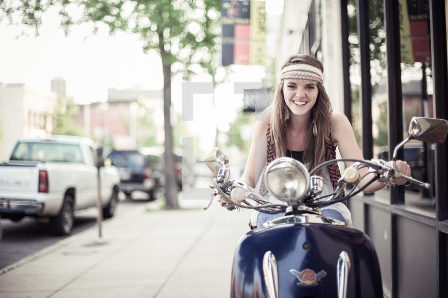 young woman on a motorcycle 