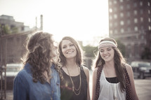 young women laughing and talking 
