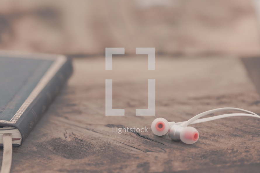 earbuds and journal 