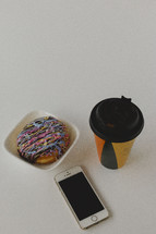 coffee and donut with iPhone 