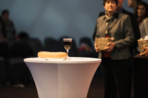 communion bread and wine during a worship service 