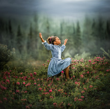 joyful child leaping through a field of flowers 