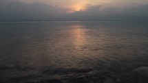 Compilation of various sunrise shots in Israel and the Sea of Galilee including a time lapse of a sunrise over a city