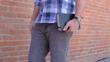 Man on the Street with his Bible