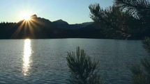 sunset over an alpine lake 