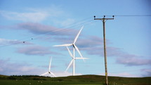 Moving wind turbines by telephone lines.