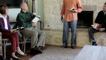 Adult Bible study in a home.