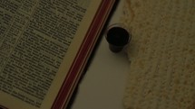 Open Bible with the eucharist.