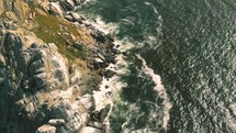 aerial view over a rocky island 