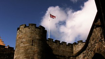 British flag flying over a castle