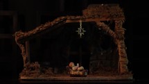 child playing with a Nativity Scene