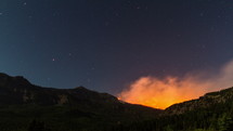 time-lapse of burning wildfire on a mountain 