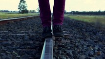 balancing walking on the tracks 
