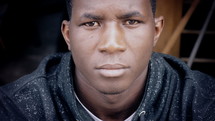 closeup of a young man's face 