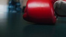 boxing gloves on the gym floor 