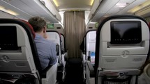 4K Airplane Passanger Cabin Slider Reveal Shot Flow Motion Airplane Departures Termanal Airport Airline Jet Plane