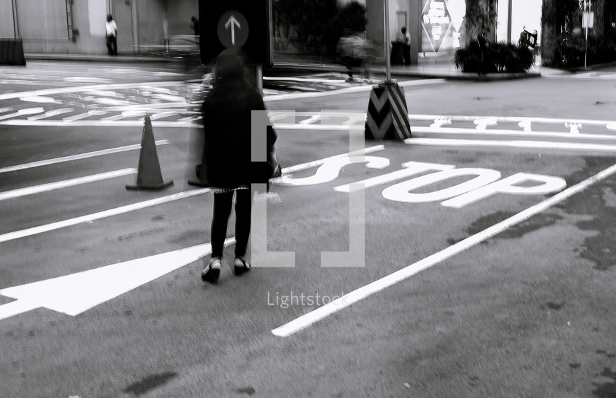 pedestrian walking on a street 