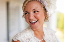 Bride smiling with veil