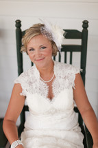 Bride sitting in a rocking chair