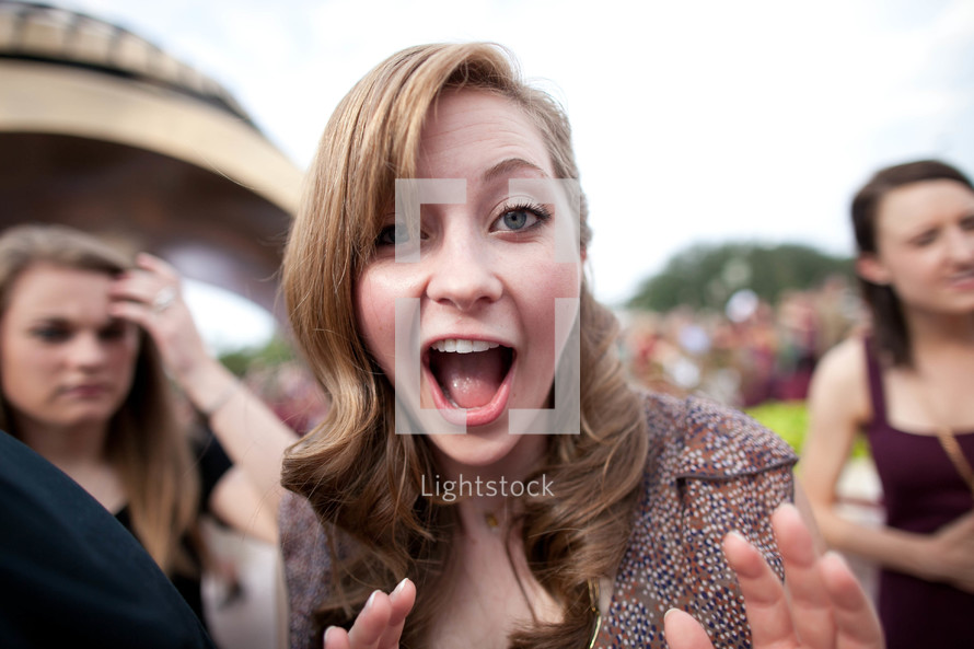 woman making a surprise face with mouth open