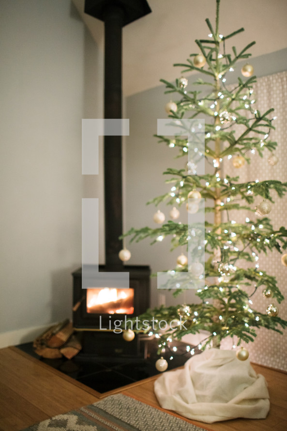 fireplace and decorated Christmas tree 