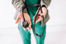 a nurse holding a stethoscope 